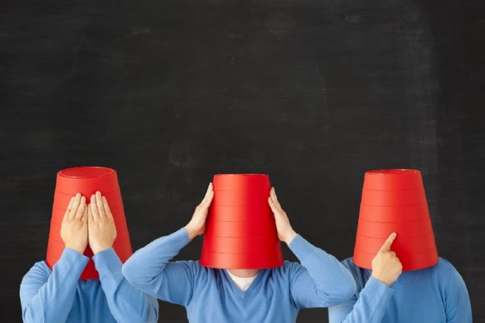 people with buckets on heads people with buckets on heads